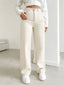 Women's autumn jeans, made of cotton denim, in a beige apricot color, straight-leg, slim fit, high-waisted, elastic waistband