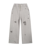 GREY DESTROYED SWEATPANTS