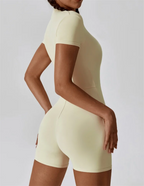 European and American nude one-piece yoga suit with stand up collar, half zipper, short sleeved fitness jumpsuit, tight fitting
