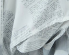 YENKYE New Women Newspaper Letter Print Irregular Hem Sling Dresses Fashion Backless Thin Straps With Chain Summer Sexy Dress