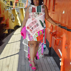 Trendy plus size high-low dress with a retro newspaper print design, bringing a fashionable, vintage vibe.