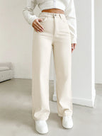 Women's autumn jeans, made of cotton denim, in a beige apricot color, straight-leg, slim fit, high-waisted, elastic waistband