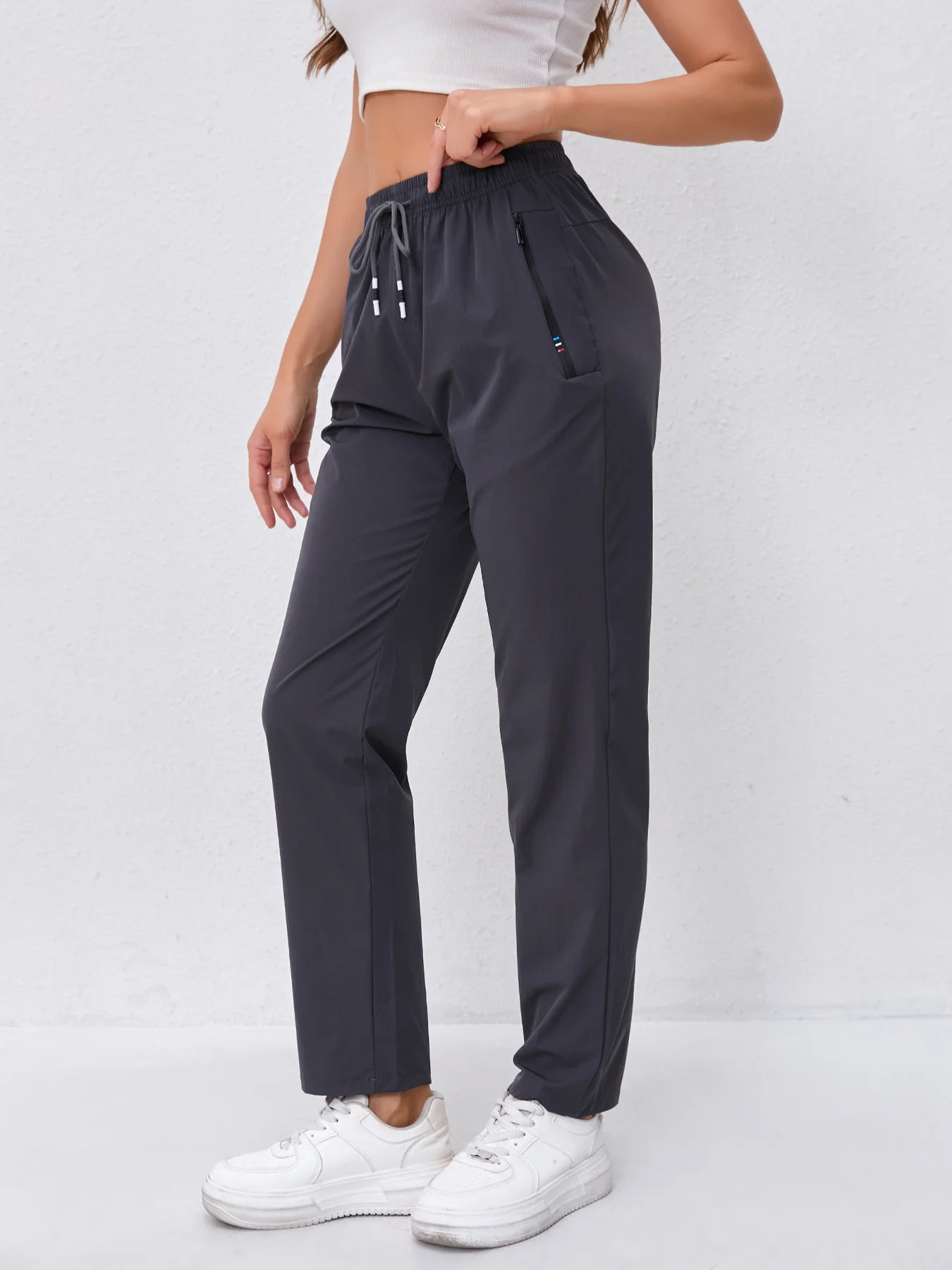 Women's High-Waist Slimming Drawstring Joggers with Dual Side Zipper Pockets - Lightweight, Breathable Nylon Blend Outdoor Pants Main image