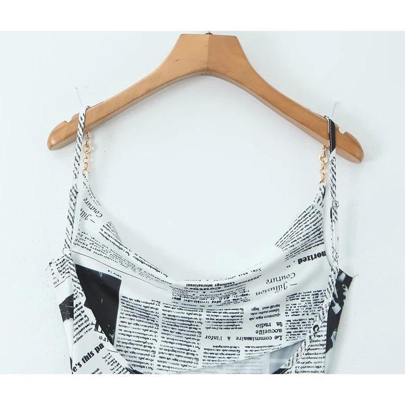 YENKYE New Women Newspaper Letter Print Irregular Hem Sling Dresses Fashion Backless Thin Straps With Chain Summer Sexy Dress