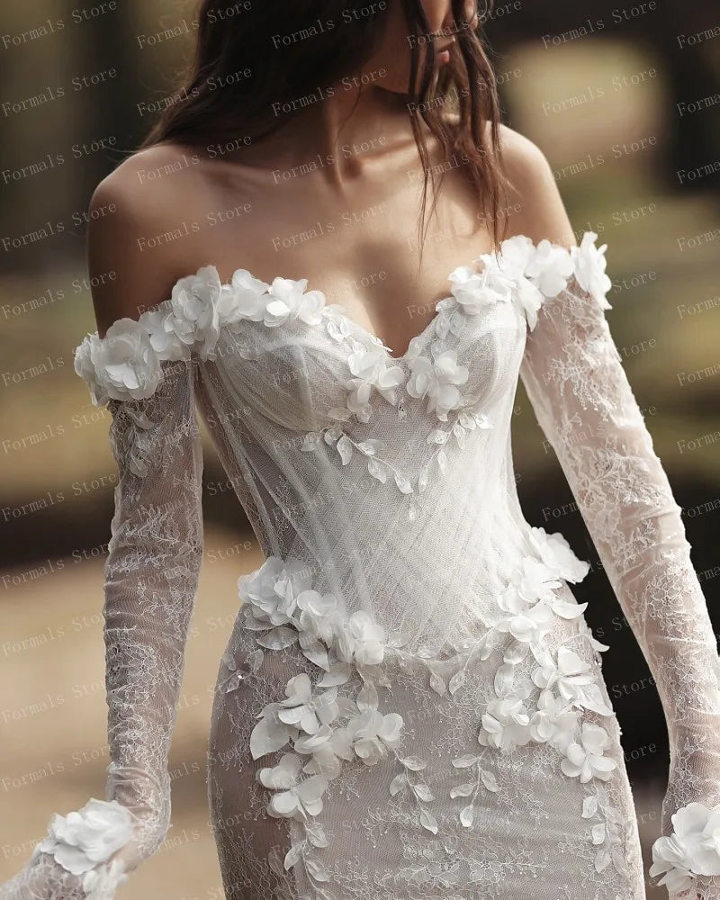 Graceful White Wedding Dress Features Floral Embellishments Long Sleeves With Deep V Neckline Flowing Fabric Creates Graceful